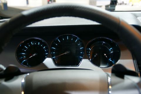 1993 Ford Taurus - Interior view of a car's instrument cluster with a steering wheel visible.