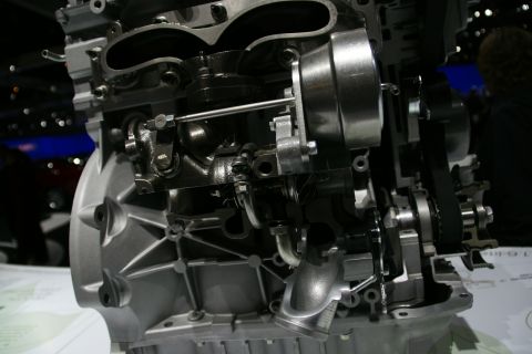 1993 Ford Taurus - Detailed view of an engine's internal workings, including a turbocharger.