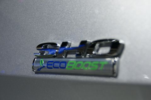 1993 Ford Taurus - Close-up of a Ford EcoBoost badge on a vehicle's exterior.