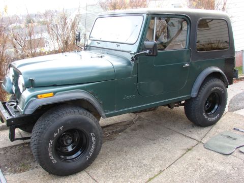 1979 Jeep CJ7 - This 1979 Jeep CJ7 is shown from the front three-quarter view, parked outdoors.