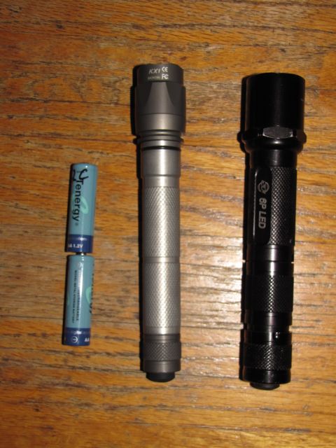 1984 Ford Bronco - This photo displays two flashlights and two AA batteries, not a 1984 Ford Bronco.