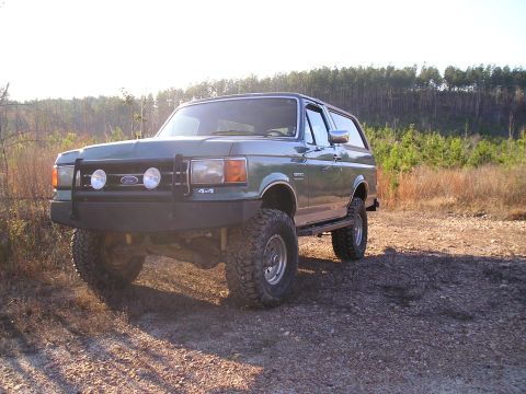 1989 Ford Bronco - This 1989 Ford Bronco is equipped with a bull bar and large off-road tires, ready for adventure.