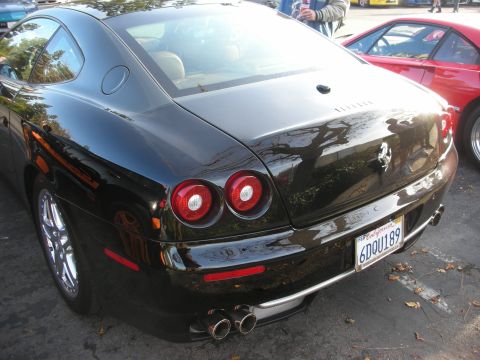 1998 Ford Crown Victoria - This Ferrari 612 Scaglietti has a distinctive rear design with quad exhaust pipes and round taillights.