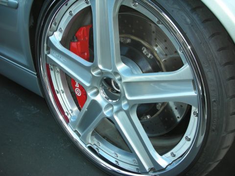 1998 Ford Crown Victoria - A custom silver wheel with a red brake caliper and drilled rotor is shown.