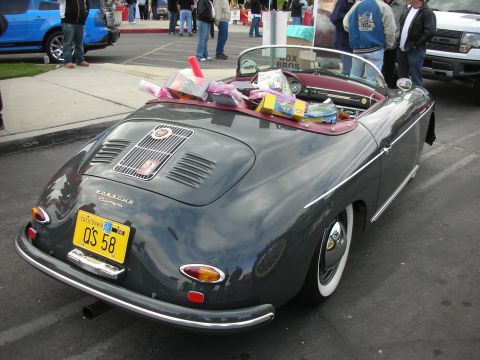 1998 Ford Crown Victoria - This Porsche 356 Carrera is loaded up with items in its passenger compartment.