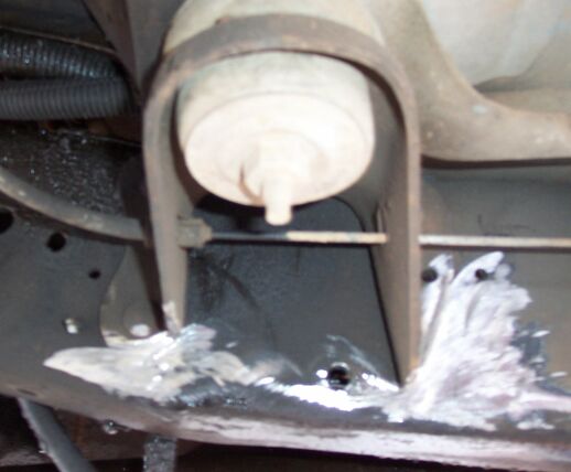 ..... here's the same body mount after a little discussion with Mr. Grinder.  This plus the mods to the hanger allow me to move it forward and achieve a better shackle angle