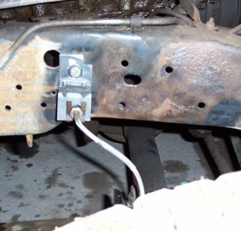 1990 Ford Bronco - I used the stock brackets off an F250/350 for the brake hard line/soft line interface, but any piece of steel could work if bent accordingly