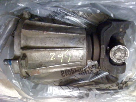 1989 Ford Bronco - Differential housing part with handwritten markings, wrapped in plastic packaging.
