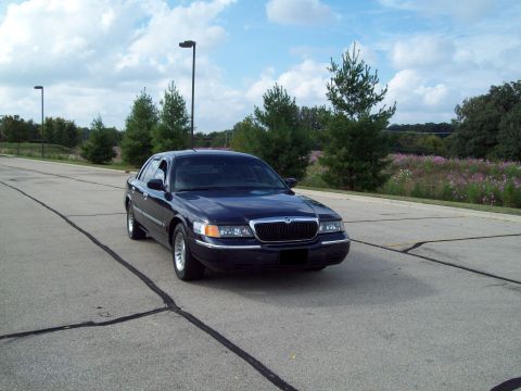 1999 Mercury Grand Marquis - This sedan has a distinctive grille and headlight design.