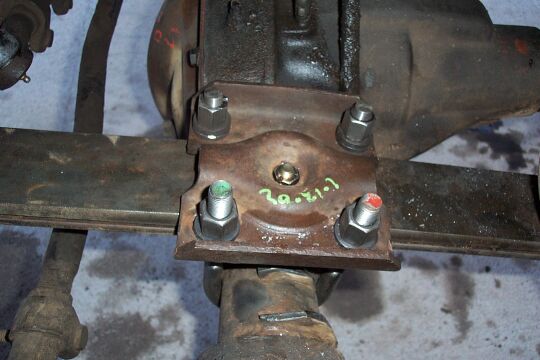 On the driver's side I temporarily used an F250 TTB spring plate.  Note this is how a spring plate should NOT be oriented (it can buckle in the middle)