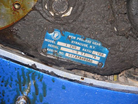 1978 Ford Bronco - A blue metal data plate from New Process Gear shows assembly number D8TA7A195AB and the year 1978.