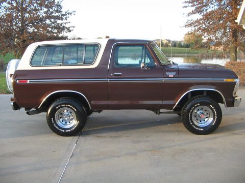 1978 Ford Bronco - This 1978 Ford Bronco is shown from the side, parked outdoors near a body of water.