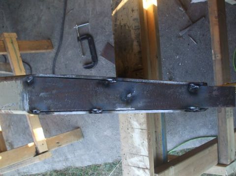 1995 Ford Bronco - A close-up view of a welded metal beam, suggesting custom fabrication or repair work.