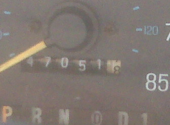 1989 Ford Bronco - Close-up of an odometer with mileage and speed displayed, along with gear selection indicators.