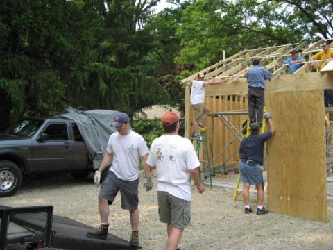 1996 Ford Bronco - Construction underway with a covered truck on site.