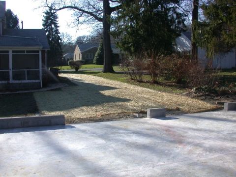 1996 Ford Bronco - A residential scene shows a driveway under construction with houses and trees visible.