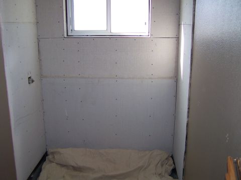 1991 Ford Bronco - This room appears to be under construction with unfinished walls and a window.