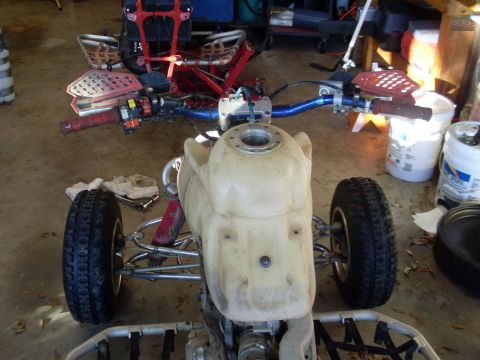 1987 Honda 250 R - Front view of a 1987 Honda 250 R ATV, with handlebars and fuel tank visible.