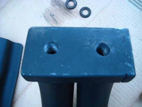 1989 Ford Bronco - A mounting bracket and two washers are shown in this close-up view.
