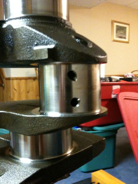 1972 Ford Ranchero - Close-up view of a crankshaft, showing two oil holes on one of the journals.
