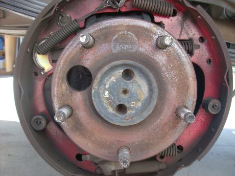 1978 Ford Bronco - This image shows the internal components of a vehicle's drum brake system, including the brake shoes and drum.