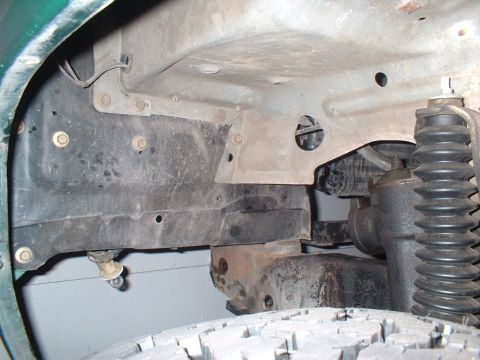 1978 Ford Bronco - Undercarriage view showing frame structure and suspension components.