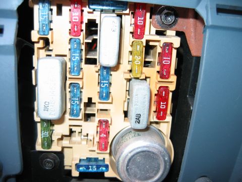 1992 Ford Bronco - Vehicle fuse box with multiple fuses visible, including 10A, 15A, 20A, and 30A ratings.