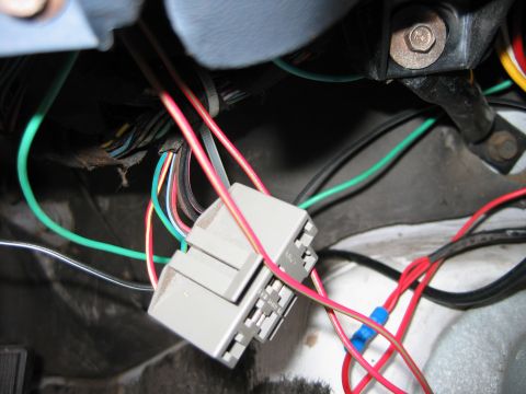 1992 Ford Bronco - This image shows a close-up view of a vehicle's electrical wiring harness and connectors.
