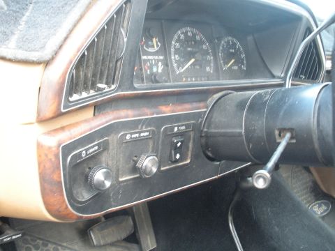 1990 Ford Bronco - The interior of a 1990 Ford Bronco shows the dashboard with gauges and steering column, indicating a model year of 1990.