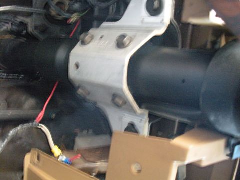 1990 Ford Bronco - Steering column bracket and wiring detail, likely from an older vehicle's interior.