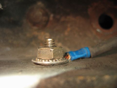 1992 Ford Bronco - A close-up view of a bolted connection for a wire terminal, with visible text indicating the source website.