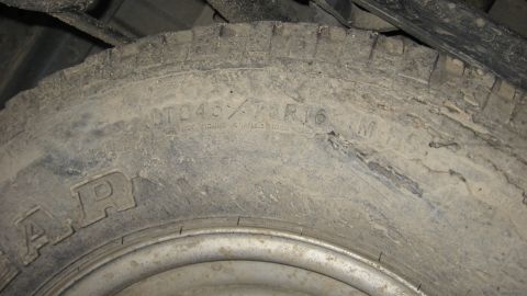 1997 Dodge 2500 - Close-up of a tire sidewall with size information LT245/75R16.