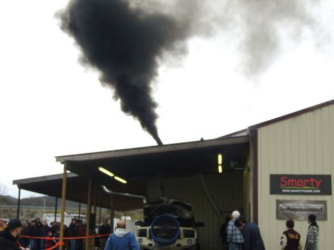 2007 Ford Mustang - A truck is tested on a dynamometer, producing a large amount of black smoke.