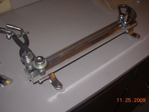 1991 Ford Taurus - I cleaned up the fuel rail a bit, it looked nasty before. It looked like rust.