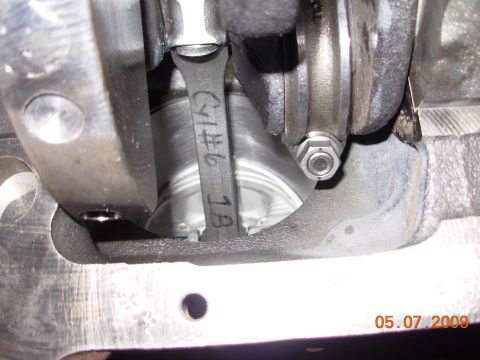 1991 Ford Taurus - Close-up view of an engine's internal components, showing a connecting rod attached to the crankshaft.