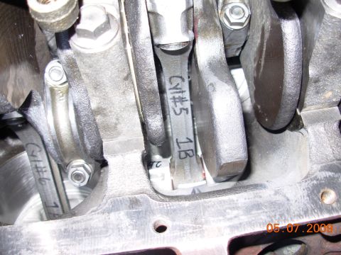 1991 Ford Taurus - Engine internals are visible, showing marked connecting rods with cylinder numbers.