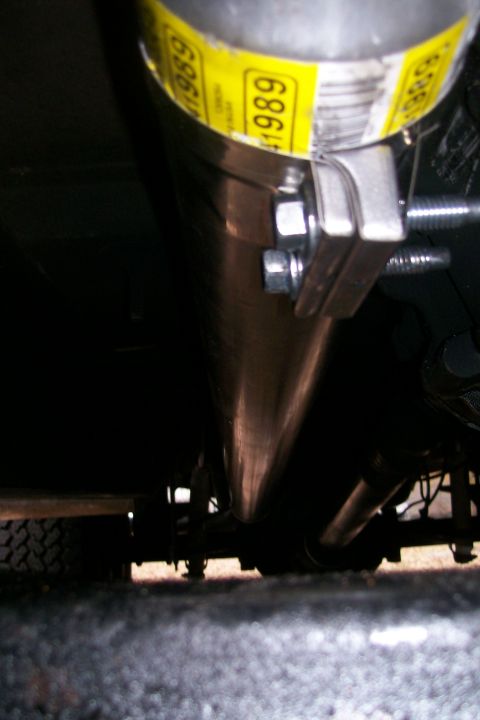 1992 Ford C-350 (Centurion Conversions) - Close-up of an exhaust pipe a yellow sticker with the number '1989' visible.
