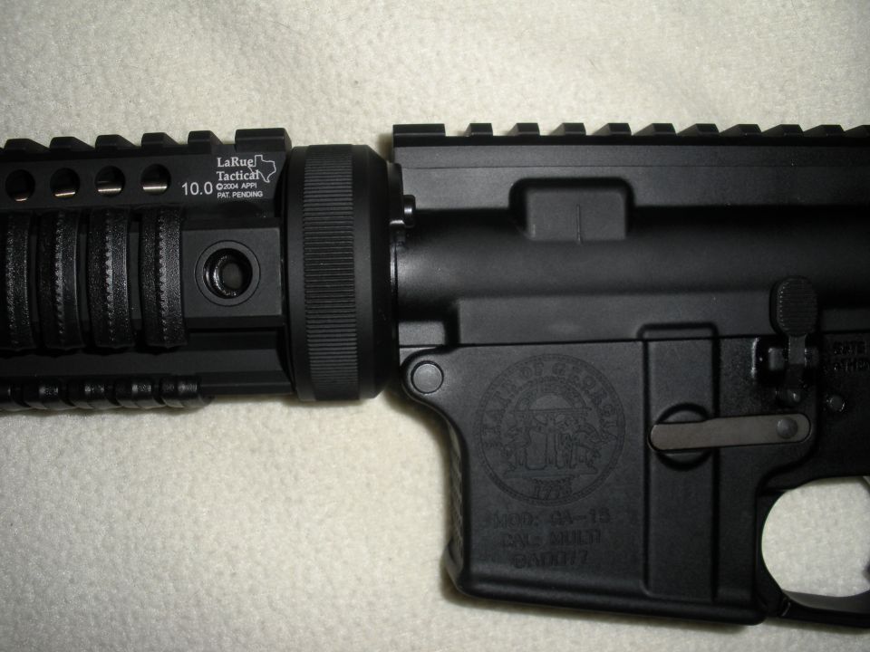 AR-15 receiver with "STATE OF GEORGIA" seal and "MODEL AR-15 CALIBER MULTI" markings