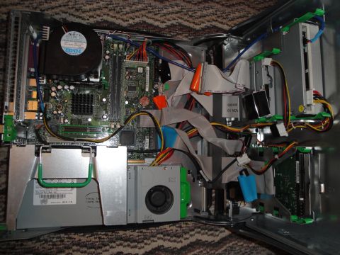 1993 Ford Taurus - The internal components of a desktop computer, including the motherboard, RAM, and various cables, are shown.