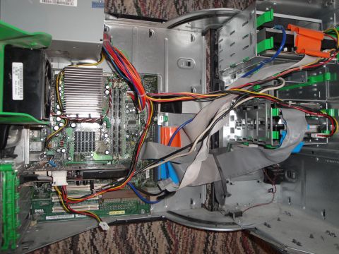 1993 Ford Taurus - Internal components of a desktop computer, including motherboard, heatsink, and various cables.