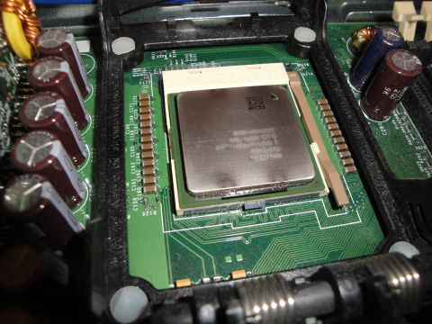 1993 Ford Taurus - Close-up of a computer's central processing unit (CPU) mounted on a green circuit board.