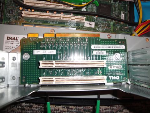 1993 Ford Taurus - Internal view of a Dell computer showing a motherboard with expansion slots and circuit boards.