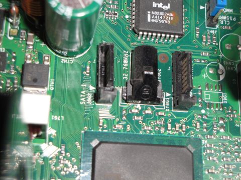 1993 Ford Taurus - This is a close-up view of a computer motherboard, showing various electronic components and connectors.