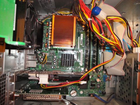 1993 Ford Taurus - Internal view of a computer's motherboard, showing various components and wiring.