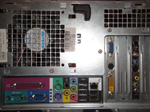 1993 Ford Taurus - Computer tower rear panel with various ports including USB, Ethernet, and video outputs.