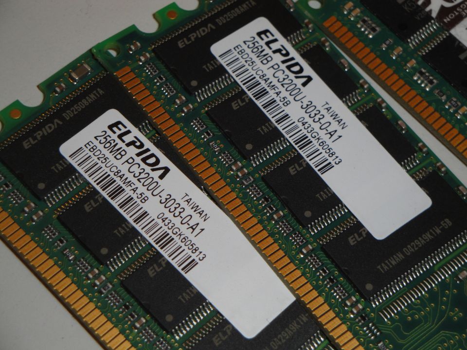 Computer RAM modules with Elpida labels showing 256MB PC3200U-3033-0-A1