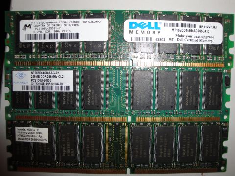 1993 Ford Taurus - Several computer memory modules are shown, including ones branded by Dell and Nanya.