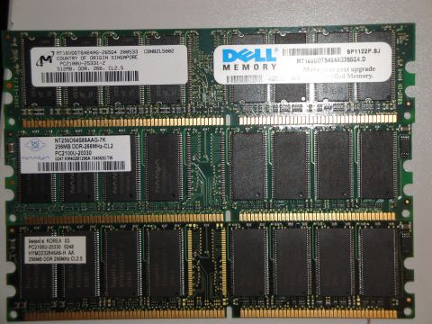 1993 Ford Taurus - Computer RAM modules are shown, with labels indicating brand and technical details.