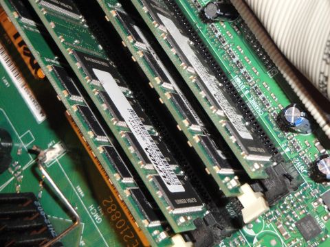 1993 Ford Taurus - Close-up of computer RAM modules installed on a motherboard.