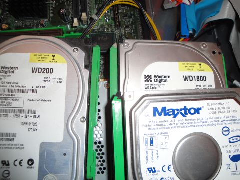 1993 Ford Taurus - Internal view of a computer showing multiple hard disk drives installed.